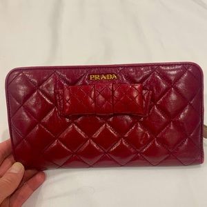 Prada clutch wallet in Maroon.  Beautiful!